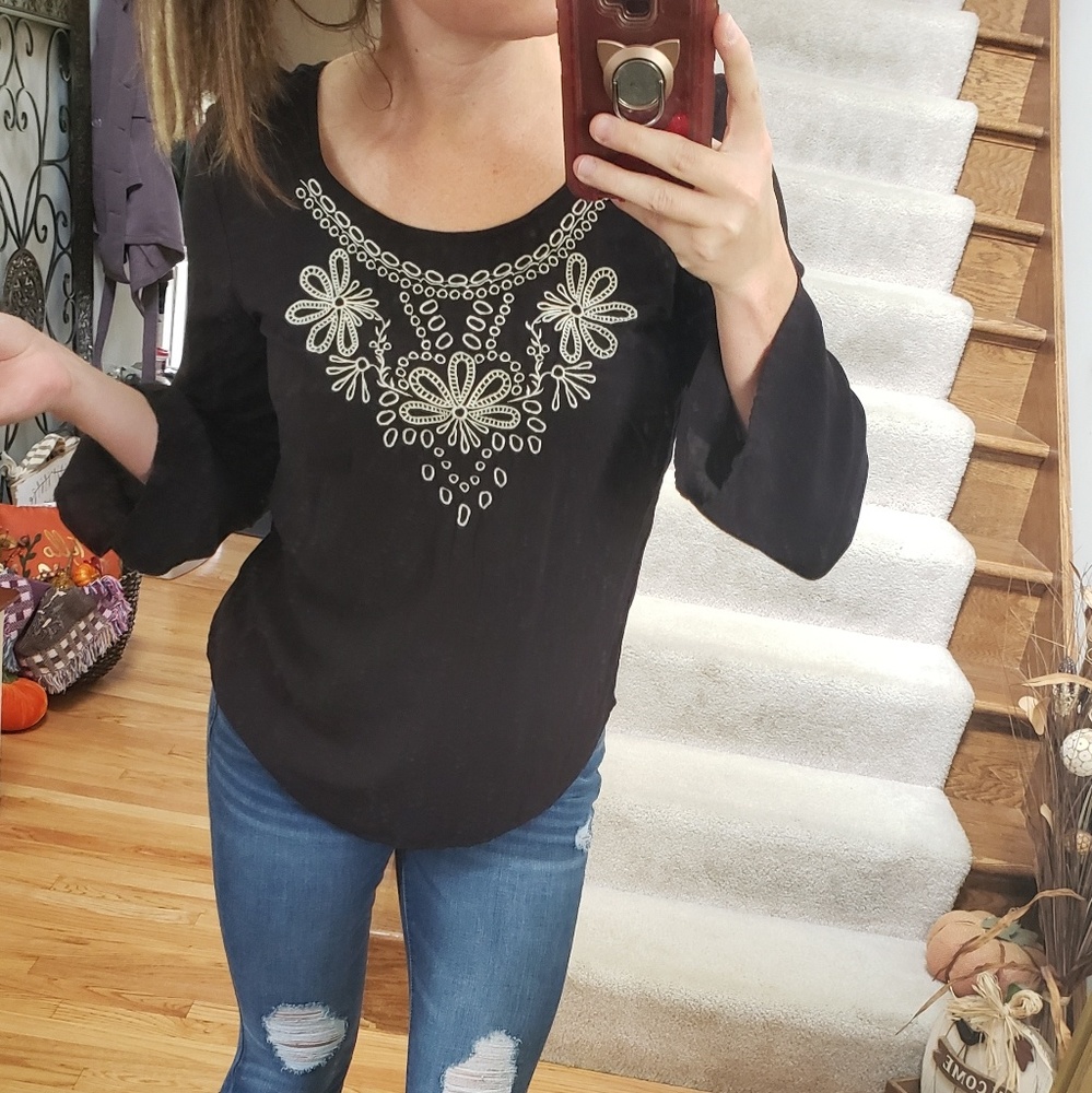 Black top.  criss cross back